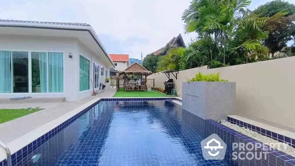 Luxurious property with private pool and lush garden, perfect for relaxation and entertainment.