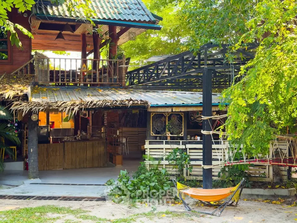 Charming tropical-style property with lush greenery and inviting outdoor spaces.
