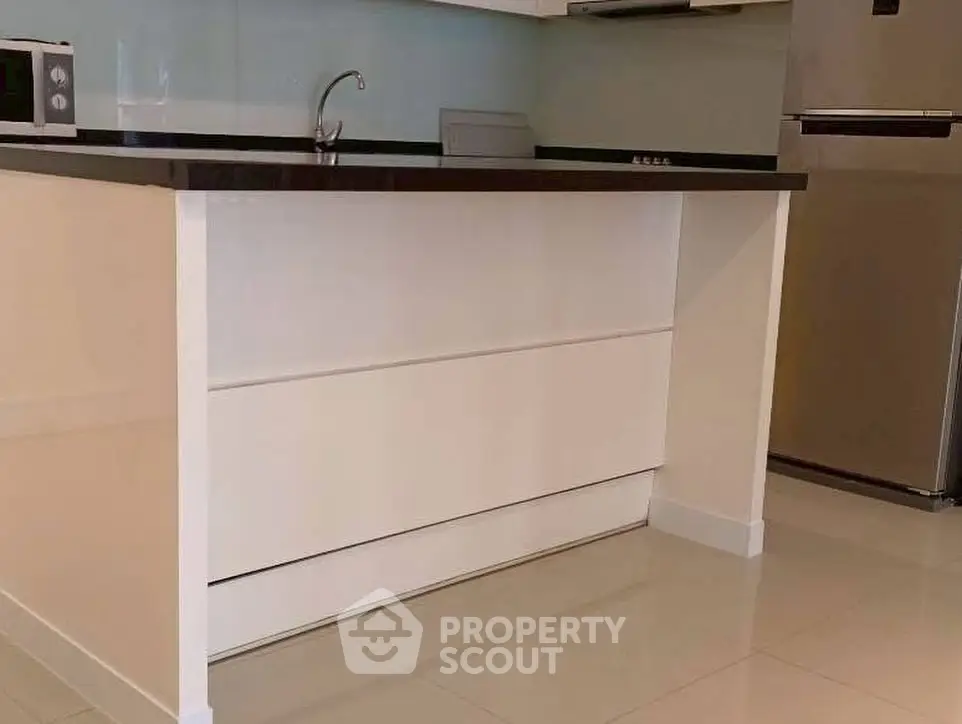 Modern kitchen with sleek design and stainless steel appliances