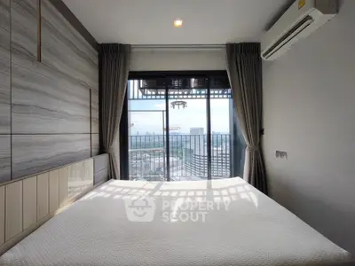 Modern bedroom with balcony view and air conditioning in high-rise apartment