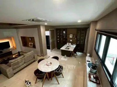 Spacious modern living room with dining area and stylish decor