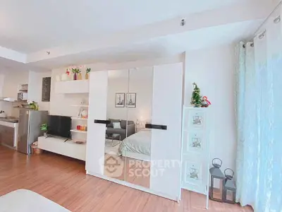 Modern living room with stylish decor and open layout in a cozy apartment.