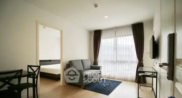 Modern living room with cozy sofa and natural light in stylish apartment
