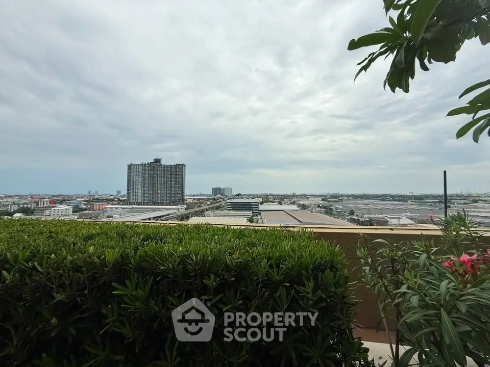 Stunning cityscape view from a lush rooftop garden, perfect for urban living enthusiasts.