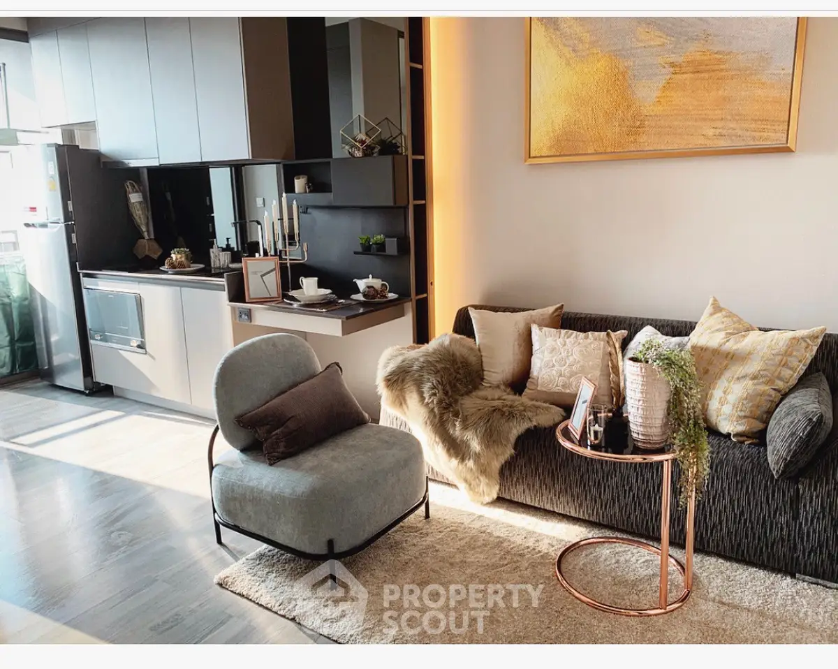 Modern living room with stylish decor and open kitchen layout
