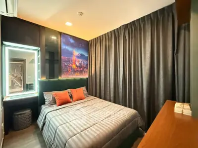 Cozy modern bedroom with stylish decor and ambient lighting