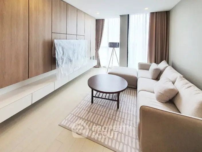 Spacious modern living room with elegant furniture and natural light