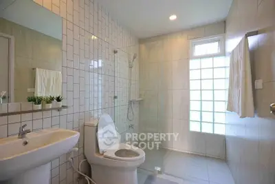 Modern bathroom with sleek design and glass shower enclosure