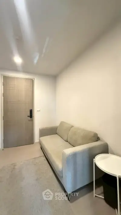 Cozy minimalist living room with modern sofa and side table