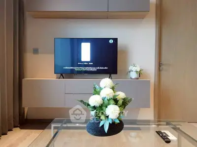 Modern living room with sleek TV setup and elegant decor