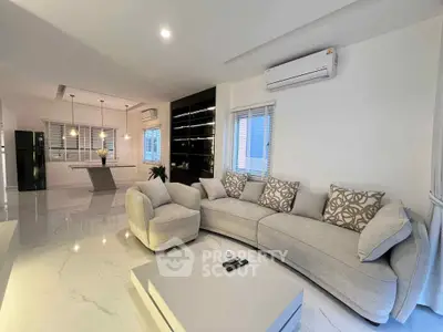 Spacious modern living room with elegant decor and open layout