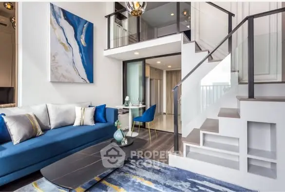 Modern duplex living room with stylish decor and mezzanine level