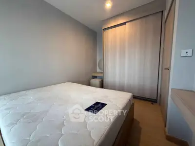 Cozy bedroom with modern design and ample storage space