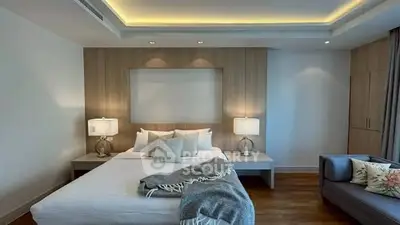 Luxurious modern bedroom with elegant lighting and cozy decor