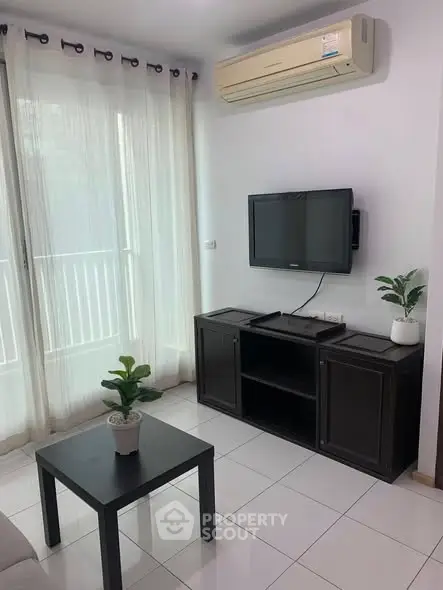 Modern living room with air conditioning and sleek furniture