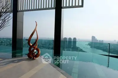Luxurious rooftop infinity pool with stunning city and river views