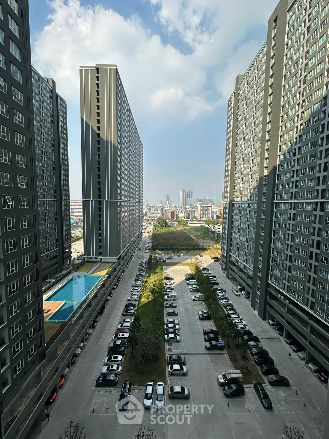 Stunning high-rise apartment complex with pool and city view