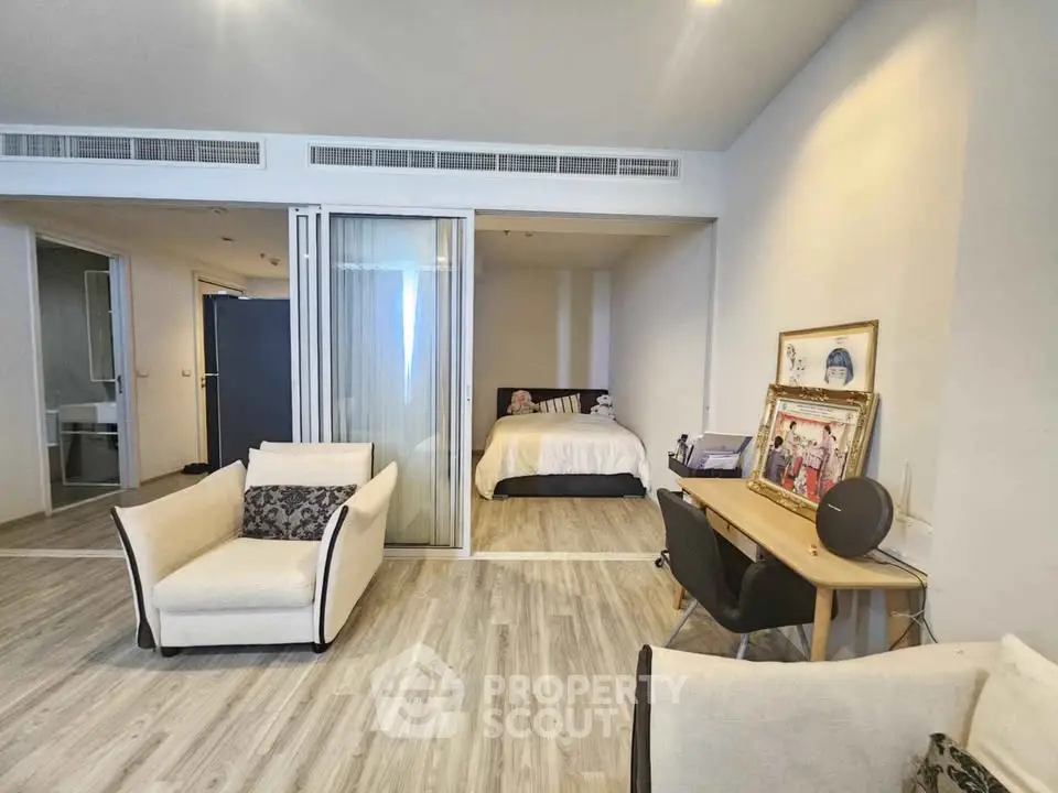 Spacious modern living room with cozy seating and stylish decor