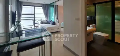 Modern apartment interior with open living area and stylish bathroom