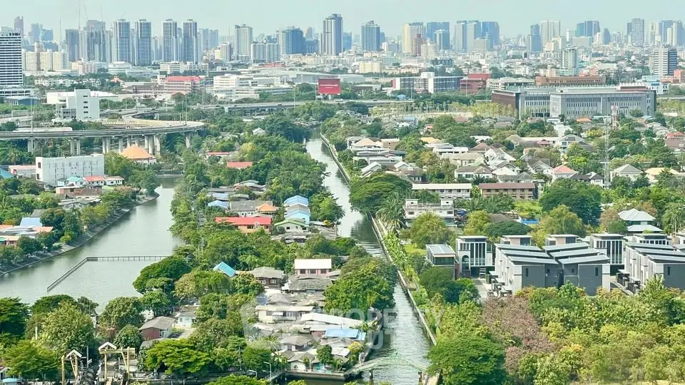 Stunning aerial view of urban landscape with river and modern city skyline