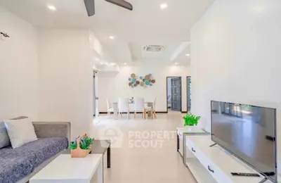 Spacious modern living room with elegant decor and open layout