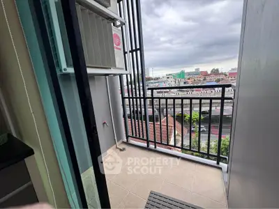 Charming balcony with city view, perfect for relaxation and enjoying urban scenery.