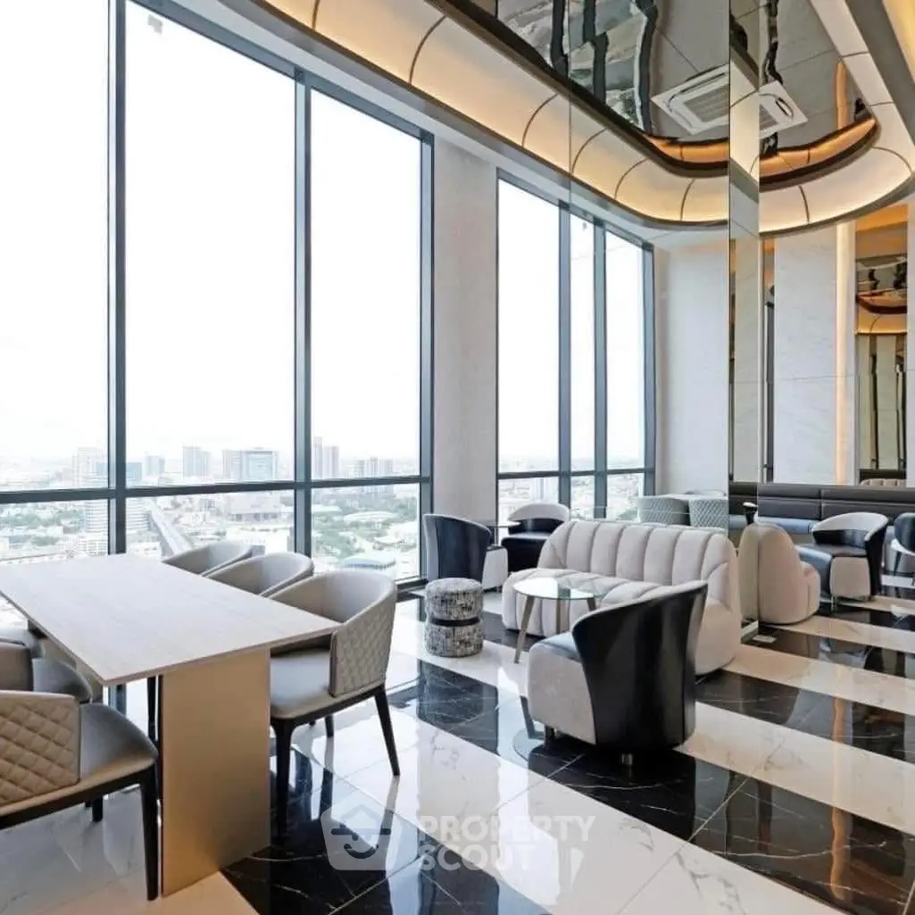 Luxurious high-rise living room with panoramic city views and elegant modern decor.