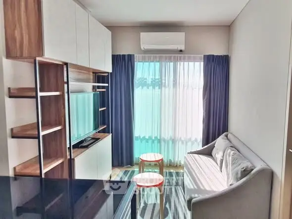 Modern living room with sleek furniture and natural light