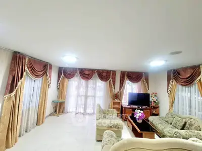 Elegant living room with luxurious drapes and classic furniture