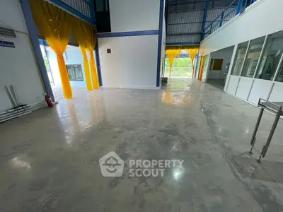 Spacious industrial warehouse with polished concrete floors and high ceilings