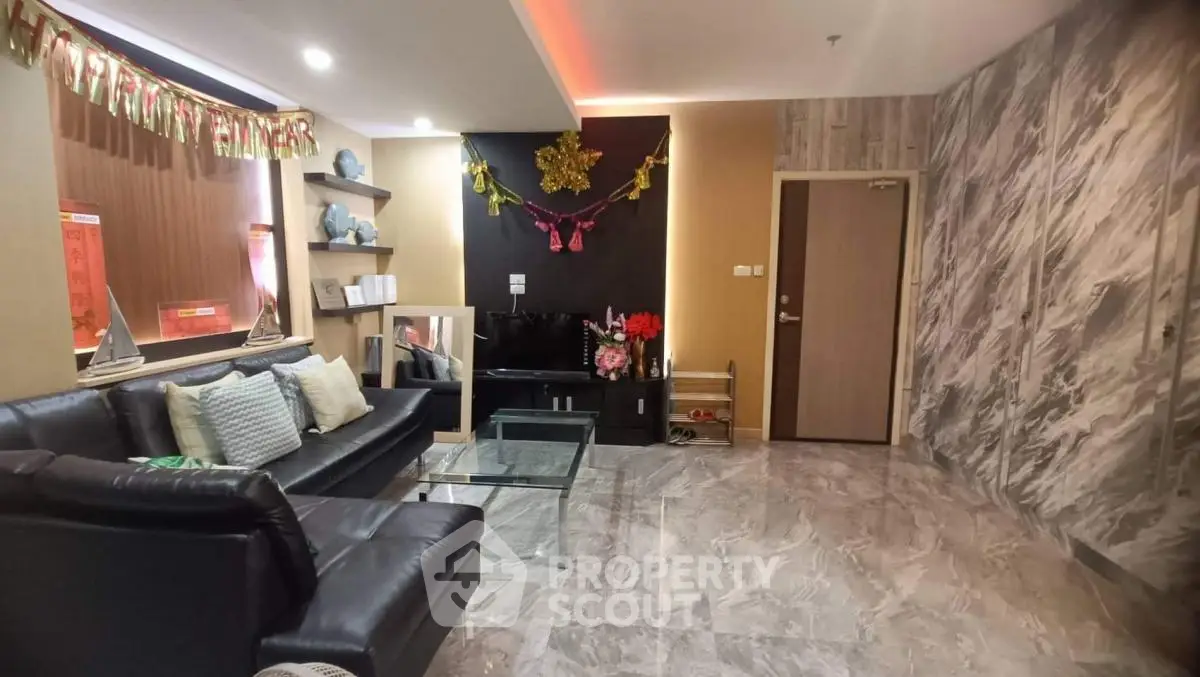 Stylish living room with modern decor and marble flooring