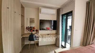 Modern bedroom with balcony access and stylish workspace
