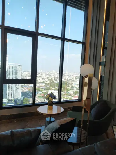 Luxurious living room with stunning city view through large windows