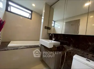 Modern bathroom with sleek design and luxurious finishes