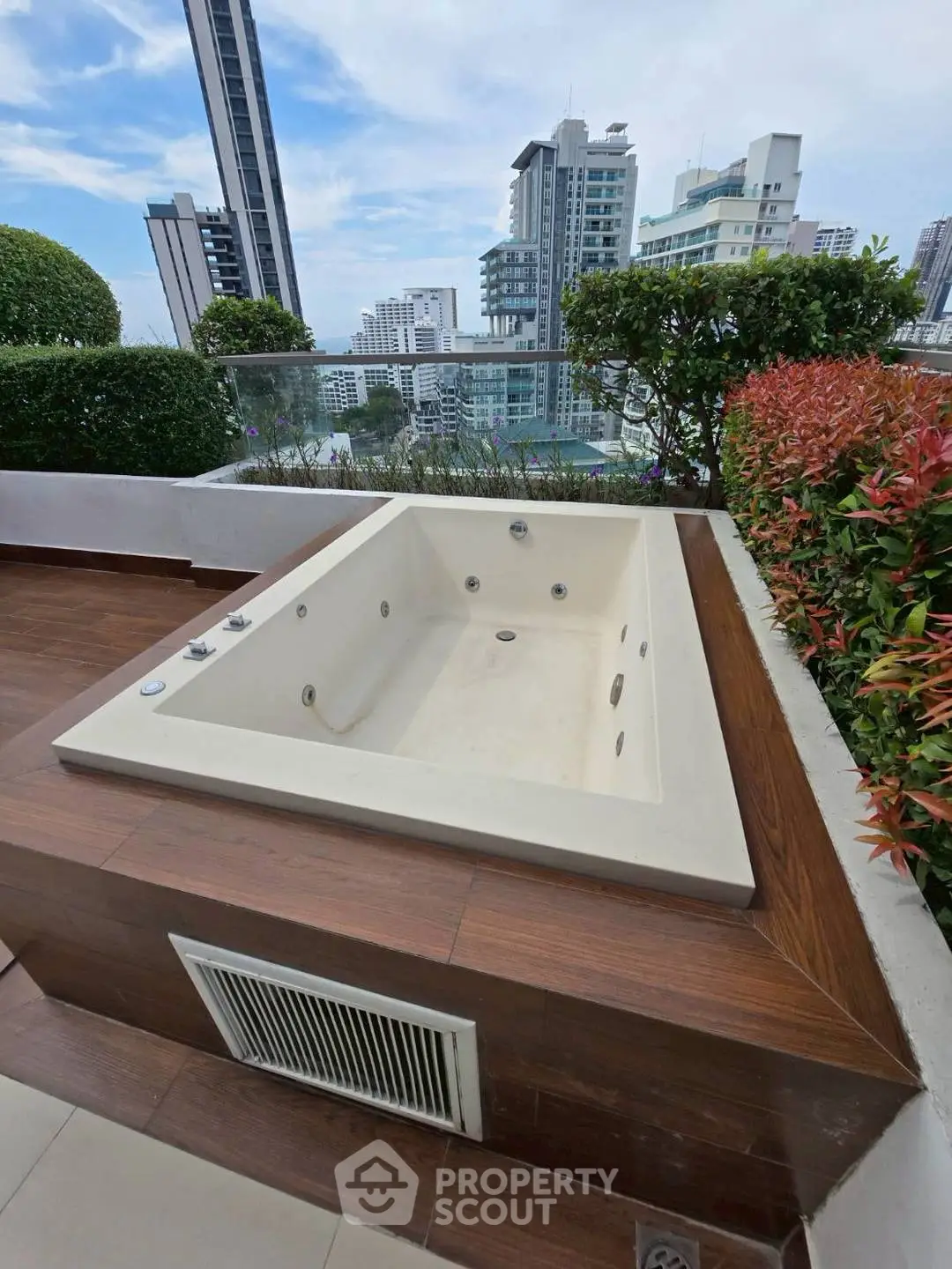 Luxurious rooftop jacuzzi with stunning city skyline view