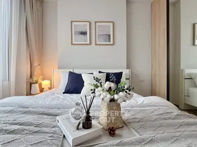 Elegant bedroom with cozy decor and stylish furnishings, perfect for relaxation and comfort.