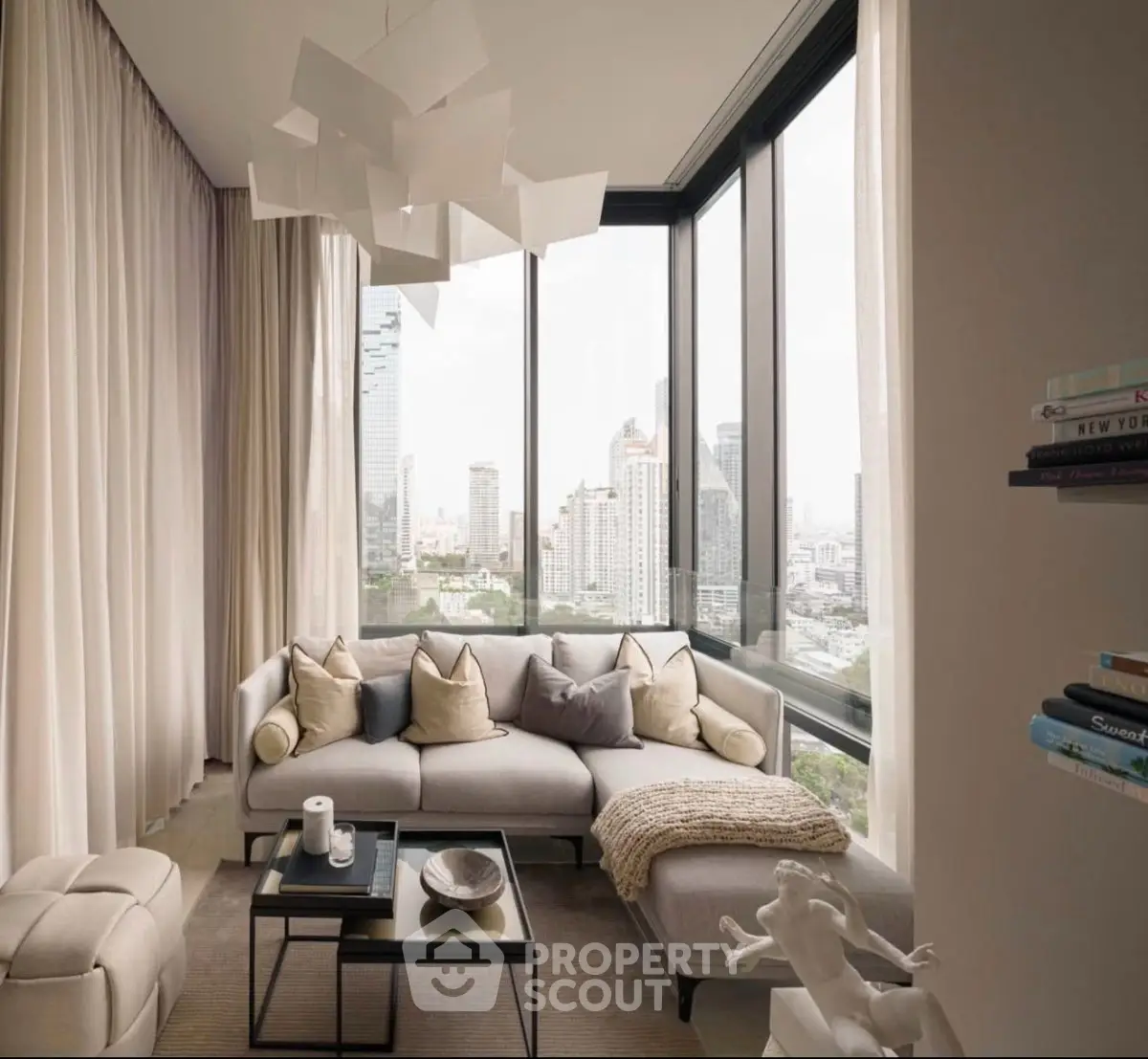 Luxurious corner living room with panoramic city views and modern decor