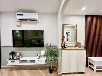 Modern living room with air conditioning and stylish decor