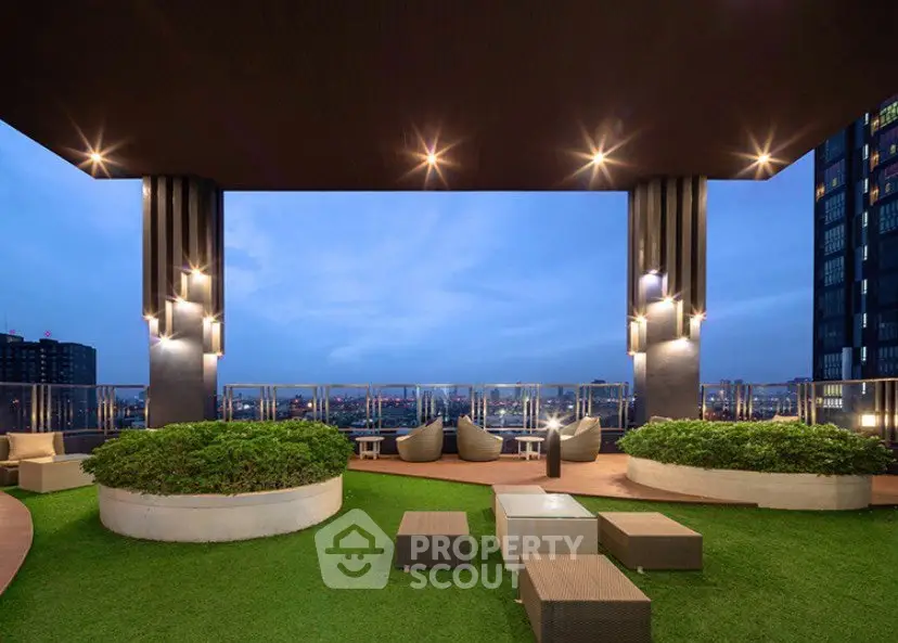 Luxurious rooftop terrace with stunning city views and modern seating area.