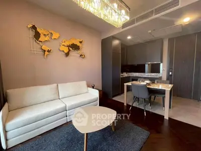 Modern living room with elegant decor and open kitchen layout