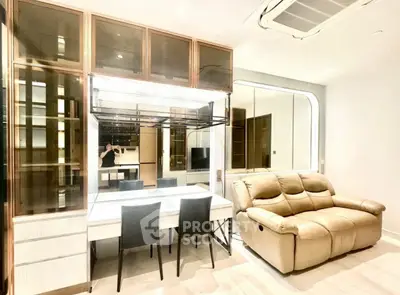Modern living room with sleek furniture and built-in storage solutions
