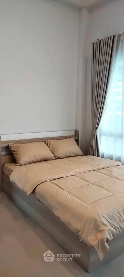 Cozy bedroom with modern decor and natural light