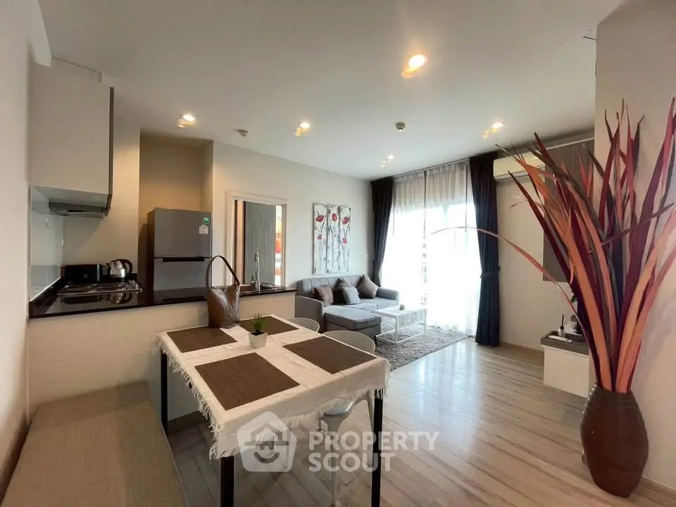 Modern open-plan living room with stylish decor and natural light