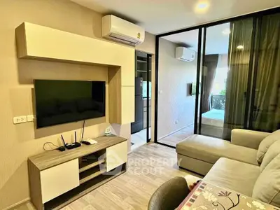 Modern living room with sleek TV unit and cozy sofa in stylish apartment
