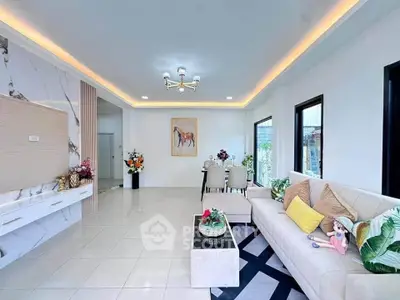 Spacious modern living room with elegant decor and natural light