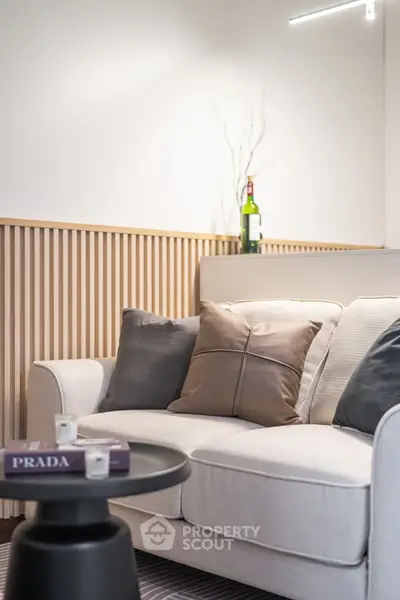 Stylish modern living room with cozy sofa and elegant decor