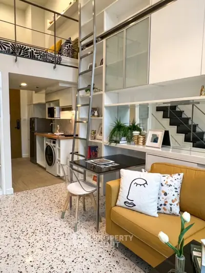 Modern loft apartment with stylish decor and mezzanine level