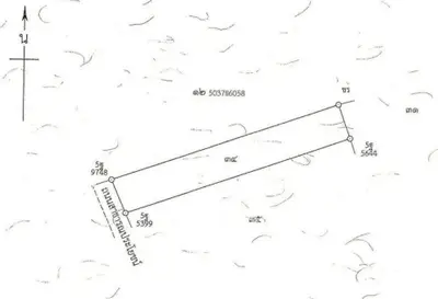 Land plot schematic with measurements and directional compass for real estate development.