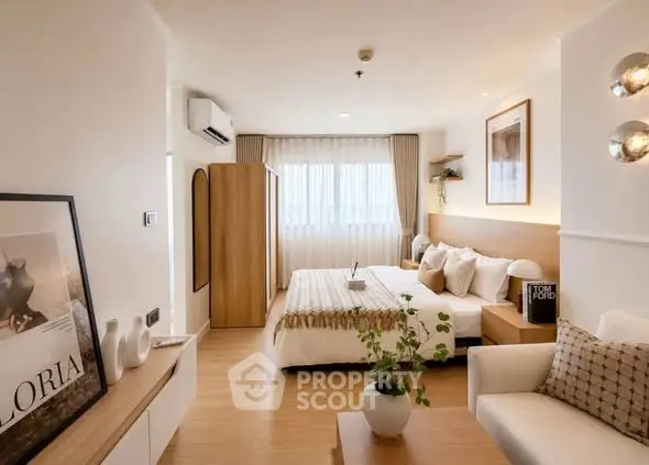 Stylish modern bedroom with cozy decor and natural light