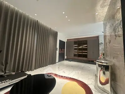 Luxurious modern living room with elegant marble flooring and stylish decor